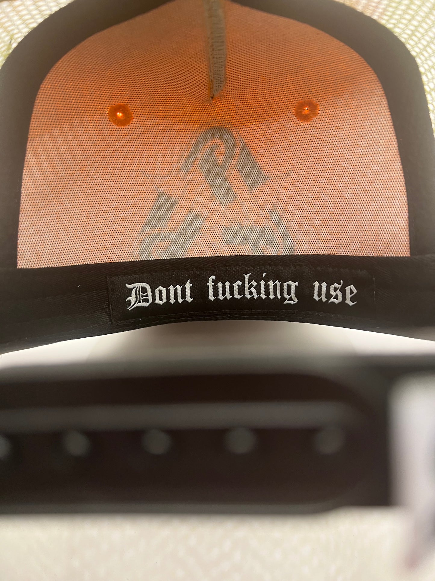 Chain logo “don’t use” Camo and Orange SnapBack